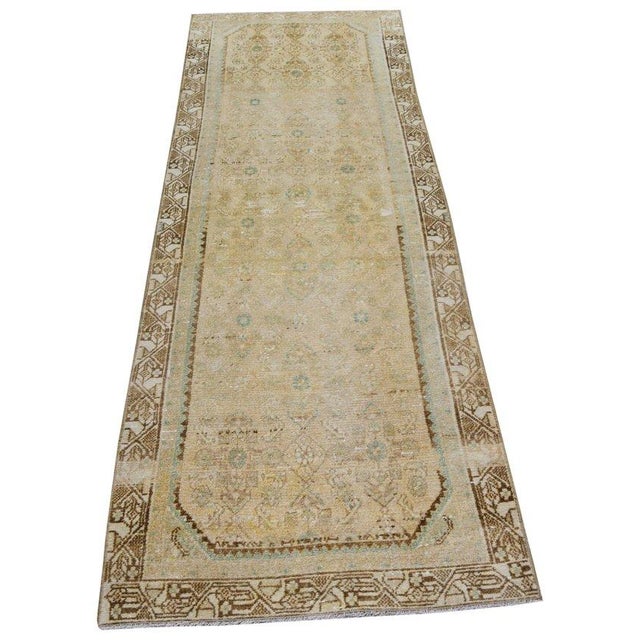 Hand-knotted with care using traditional rug-making techniques, this wool rug blends timeless craftsmanship with a modern...