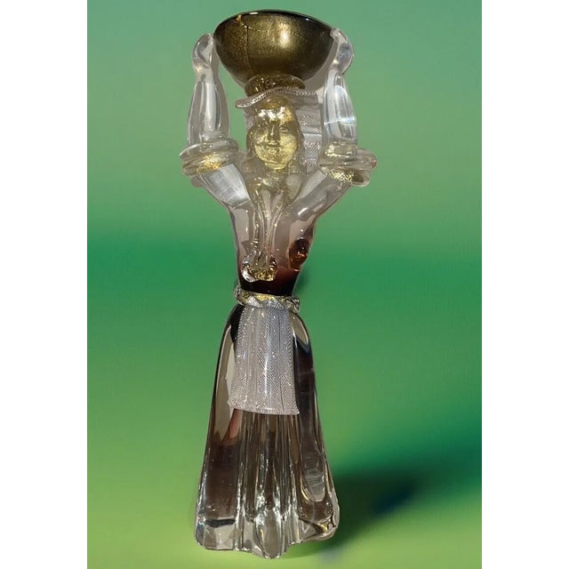 An elegant hand-blown Murano glass sculpture attributed to Fornace Salviati, Venice, circa 1960s. This beautifully...
