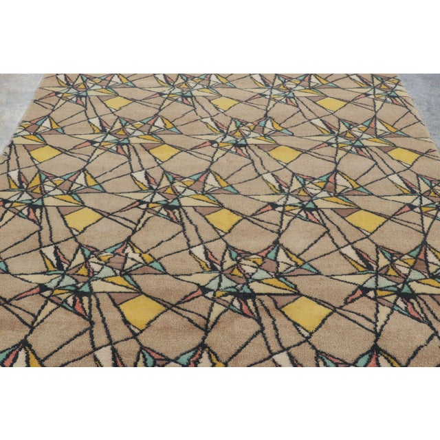 Hand-knotted in wool circa 1960–1970, this 7x10 vintage Turkish rug is a particularly rare and expressive piece,...