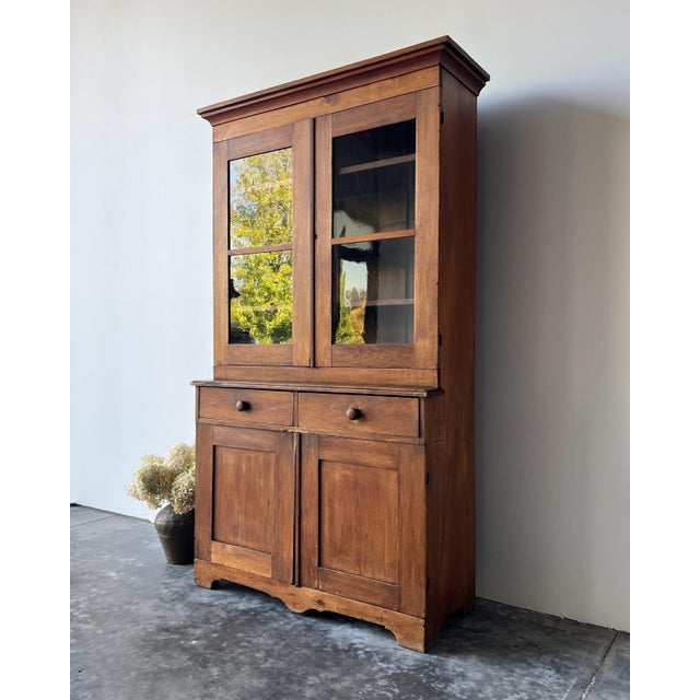 American antique pine one piece step back hutch with original wavy glass from the late 1800s. A beautifully crafted piece...