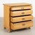 19th century Danish chest crafted in pine with gentle curves to each of the four drawers. Slightly canted front corners...