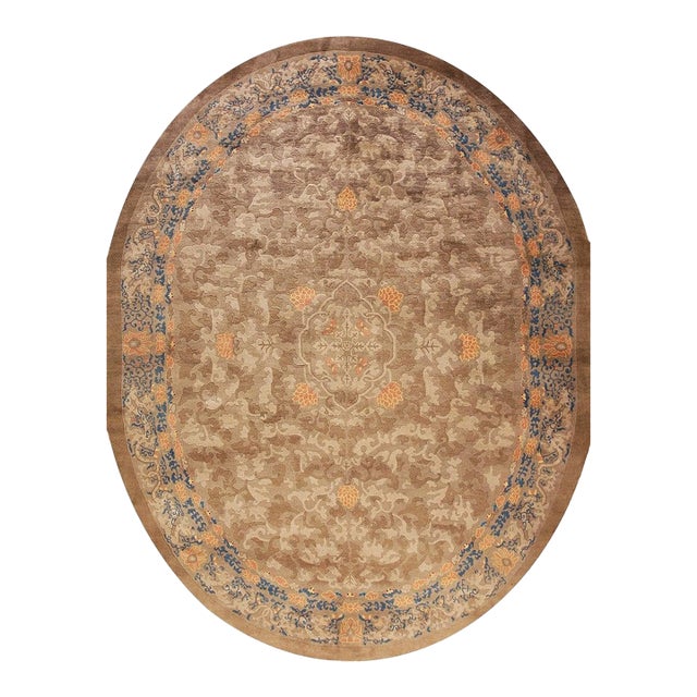 Excellent Tan-Camel Background in a Chinoiserie Pattern Antique Oval Chinese Peking Dragon Rug For Sale