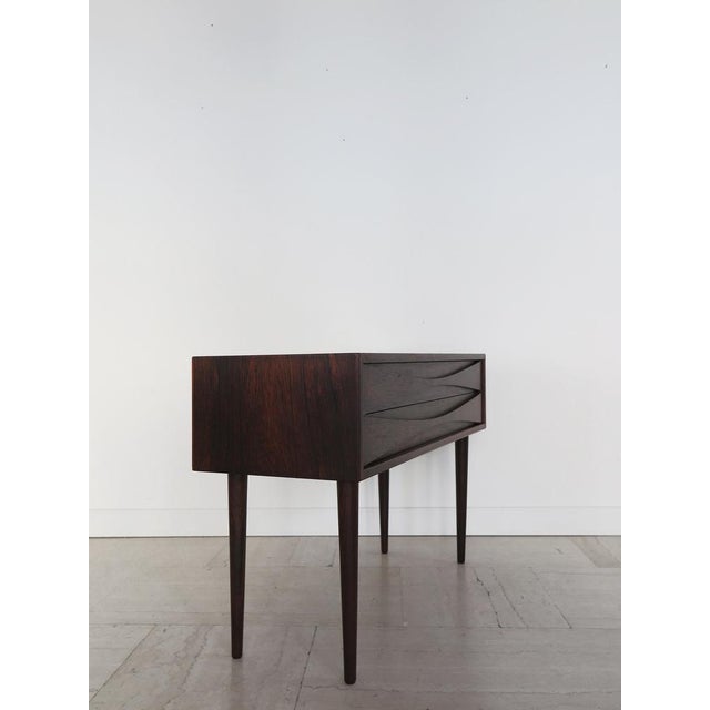 Scandinavian midcentury modern design dark wood night stand or little chest of drawers with two chests designed by Arne...