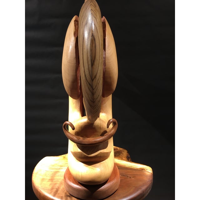 SUSHI 6 is preceded by five other SUSHI sculptures. Each new sculpture has to be goofier than one before. The woods are...