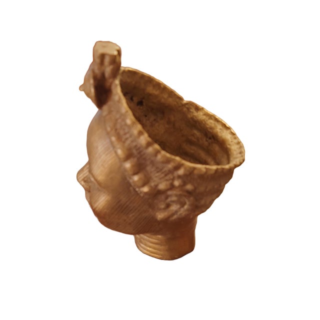 Nigerian Ife Head Bronze Sculpture Well crafted bronze sculpture by Benin bronze casters using the lost wax process....