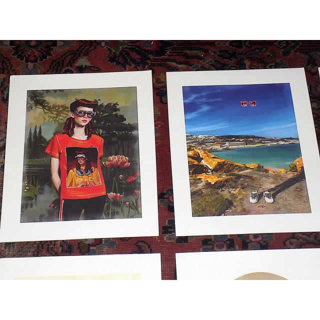 This set of twelve (12) vintage folio size surrealist lithographs (offset) from a Gucci catalogue will look great in home...