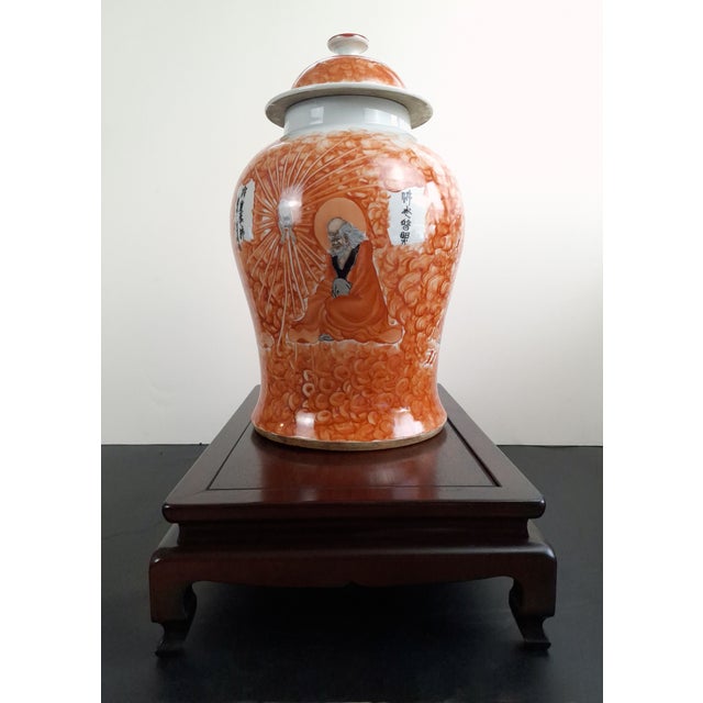 Chinese porcelain Four Arhats Lidded jar, a finely formed heavy vase with a polychrome exterior and a white glazed, short...