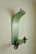 Swedish Grace Wall Candle holder in a green painted metal with golden shades at the edges. Holds two candles with vertical...