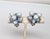 1960s rhodium plated -prong set round blue/white givre with 3 textured baby blue bead dangles clip earrings. Unmarked,...