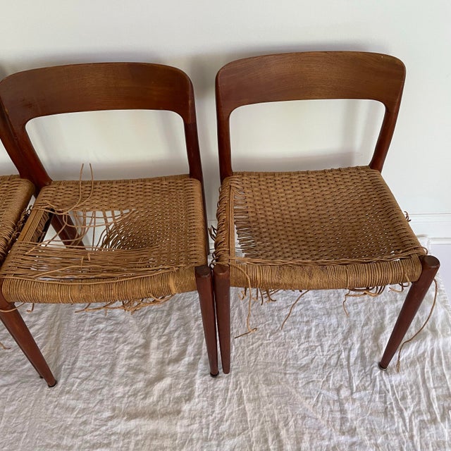 Four mid century model 75 chairs by Neils Otto Moller. First designed in 1954 as part of Mollers New Modern Series. The...