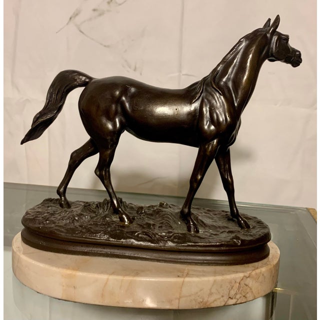This is a substantial and finely detailed "Animalier" bronze sculpture of an Arabian Mare, cast after the celebrated 19th-...