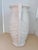 favorite among McCoy fans is this tall vase in a nice white satin glaze. Styled with a leaf like patter on the sides and 2...