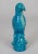 Chinese very finely modeled turquoise glazed parrot with open beak. The bird is perched on pierced rockwork.