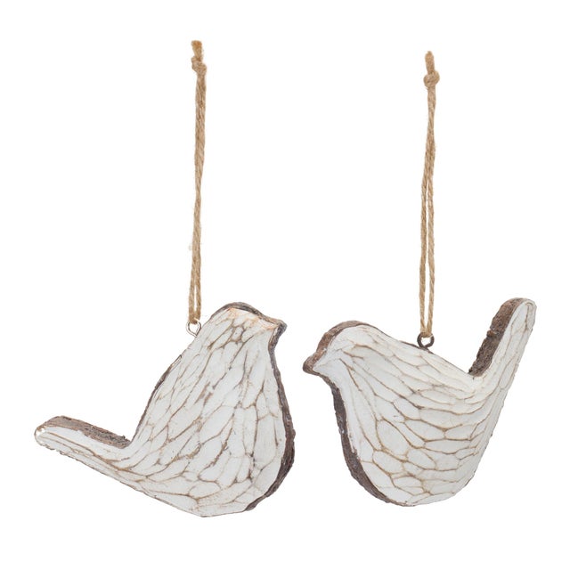 Add a rustic touch to your holiday decor with our Carved Bird Ornament Set. Crafted from durable resin, each ornament...