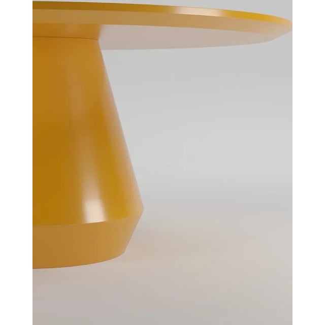 Contemporary Modern Charlotte Dining Table in Lacquer in RAL 1005 by Collector It’s as if a huge block of wood was turned...