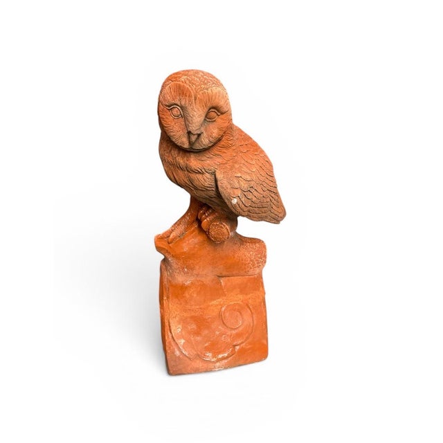 This striking terracotta owl finial is a classic piece of architectural salvage, likely originating from the mid-20th...