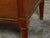 A French walnut console table from the 19th century, with white marble top, brass gallery and single drawer. Created in...