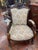 This imposing Renaissance Revival armchair is crafted from richly toned walnut and features boldly carved lion heads at...