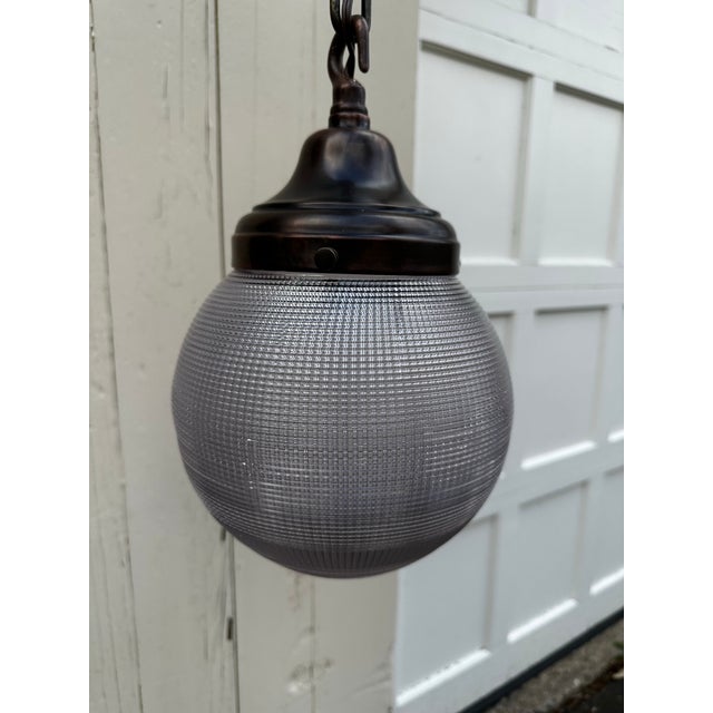 Old Lights On is pleased to offer this vintage 8" diameter waffle pattern shade with vintage copper hanging fixture. It is...