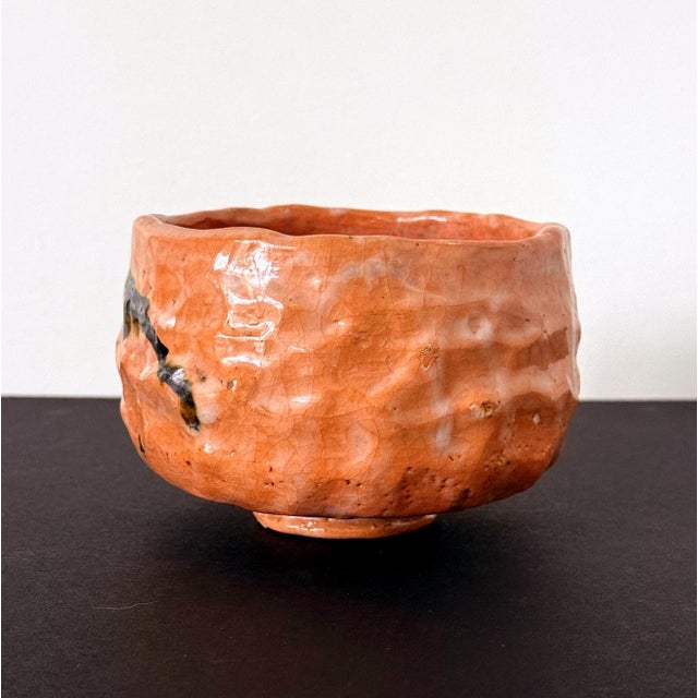 An Aka-Raku Chawan (Red-Raku tea bowl) by Raku Tannyu (1795-1854), the tenth-generation head of the Raku kiln. The Raku...