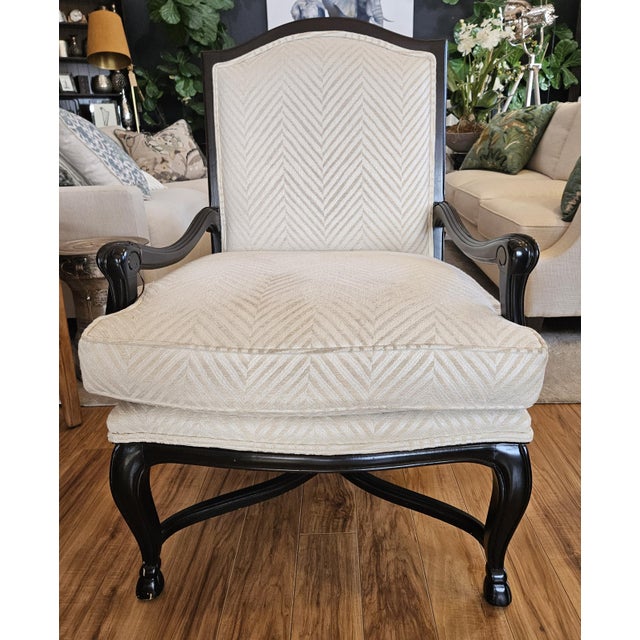 Bergere lounge chair in satin black painted finish with S Harris ivory woven chevron fabric. Tight back, seat is poly foam...