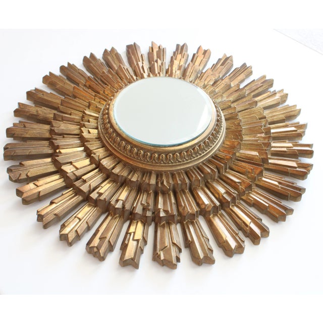 Gorgeous convex sunburst gilded mirror. We love it's gilded gold patina showing it's original time-worn elegance....