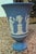 Celebrate the timeless elegance of English craftsmanship with this **Vintage Wedgwood Blue Jasperware Footed Vase**,...