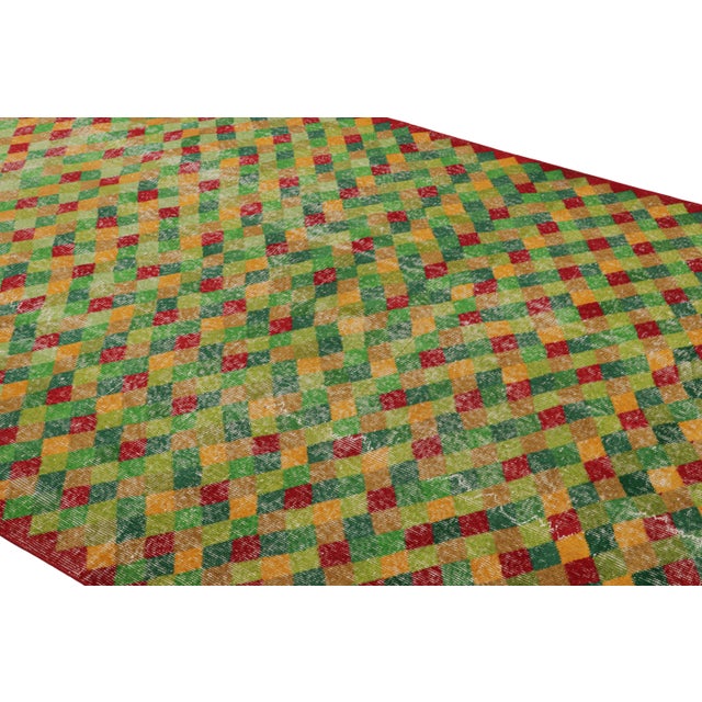 Originating from Turkey circa 1960-1970, a hand-knotted vintage 6×11 Art Deco rug joining Rug & Kilim’s Mid-Century Pasha...