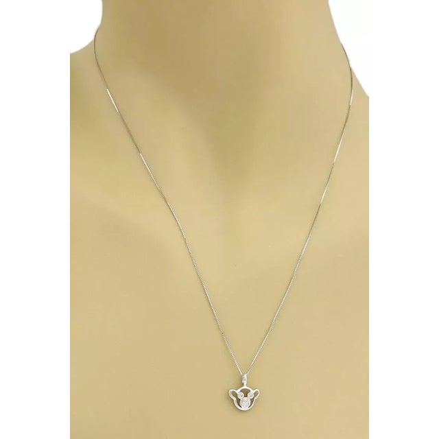 A charming and cute pendant and chain from Bliss by Damiani. This gorgeous necklace is forged from solid 18 karat white...