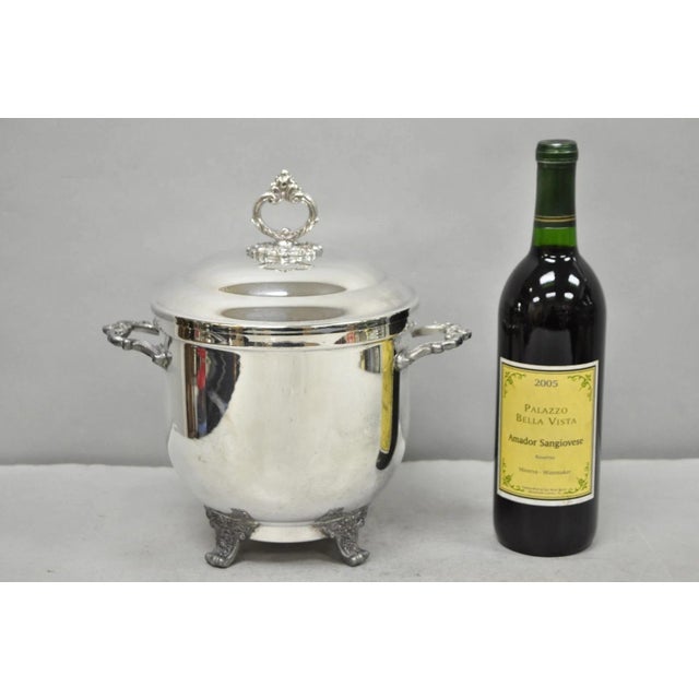 Vintage Victorian Silver Plated Glass Lined Footed and Covered Lidded Bar Ice Bucket. Circa Mid 20th Century....