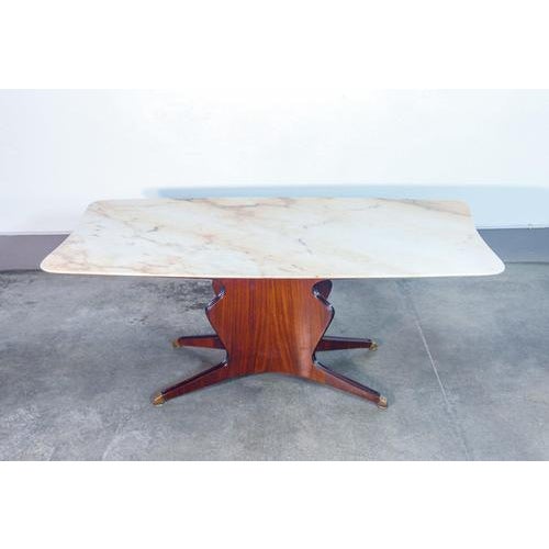 Table, designed by osvaldo borsani. marble top, wooden base with veneer finish. origin italy period 1950s designer osvaldo...