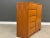 A mid century modern teak armoire with a swinging door and adjustable shelving. Made in Denmark. Circa 1970’s. Excellent...