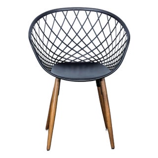 Cb2 Sidera Chair - Sleek Molded Plastic With Solid Ash Wood Legs For Sale
