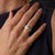 This striking vintage band showcases a refined arrangement of 38 baguette and tapered baguette cut diamonds totaling...