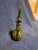 A striking antique Bohemian art glass decanter featuring a rich emerald green body embellished with hand-painted floral...