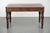 This antique English writing desk/office desk/bookcase dates from the early 19th century and features a red leather top...