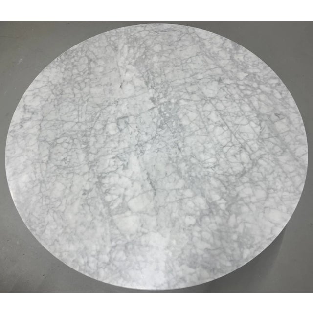 Selling a beautiful Rove Concepts Tulip Round Table with genuine Carrara marble top. Iconic, modern design inspired by...