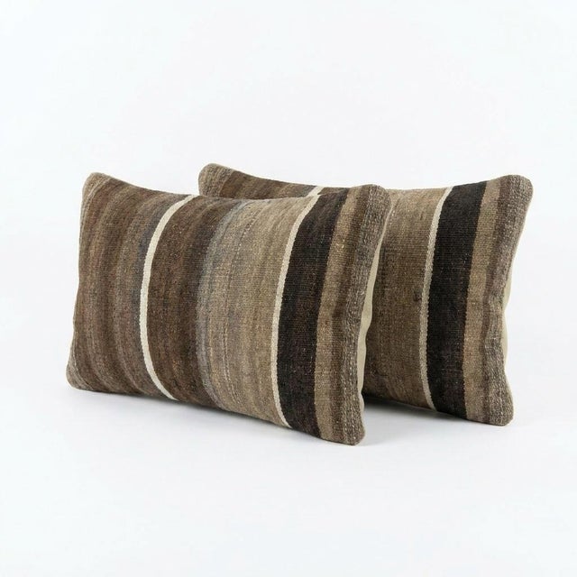This beautiful 11'' x 20'' Turkish Kilim pillow cover set was made from authentic handwoven flatweave kilim. The...