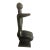 Handsome mid-century bronze sculpture in the form of a seated woman with her arms crossed. This sculpture is extremely...