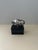 Vintage bull and bear stock market bookends featuring silver-tone metal figures mounted on black rectangular bases. Each...