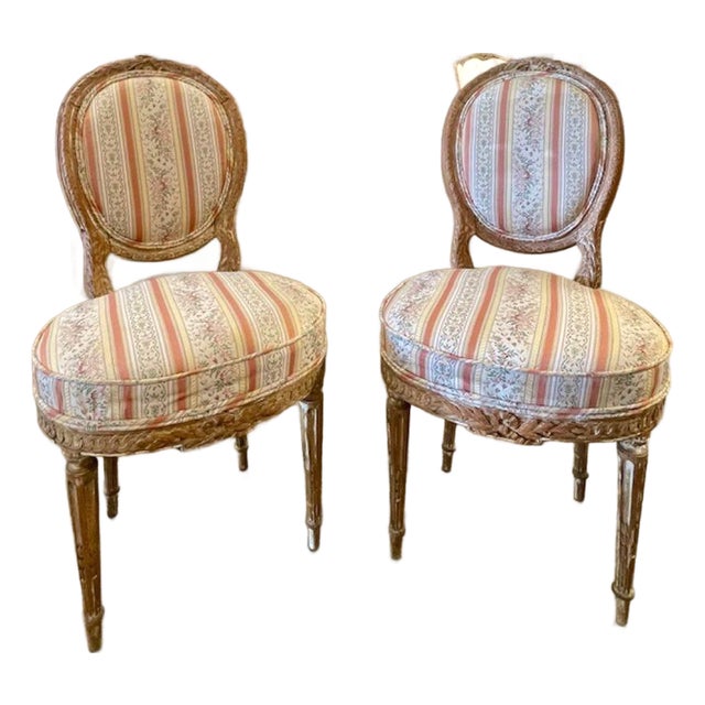 Pair of French Louis XVI Giltwood Side Chairs For Sale