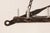A French mid 20th century eight-light wood and iron chandelier. This mid-century chandelier from France, comprised of an...