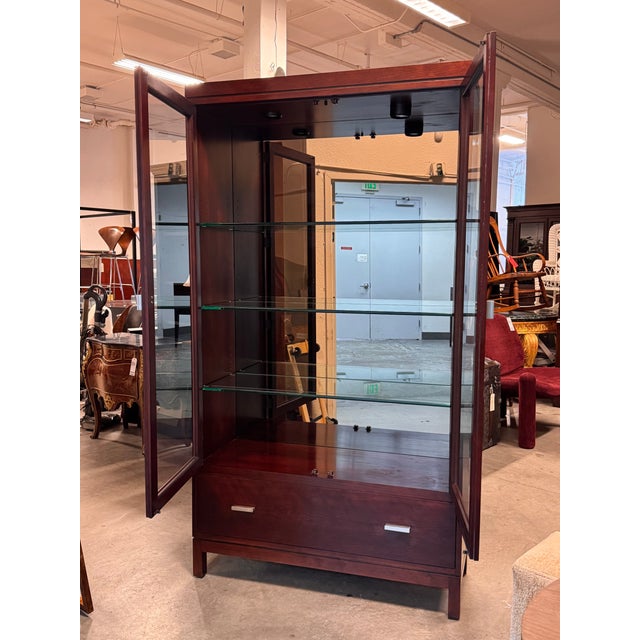 Design Plus Gallery presents the Metropolitan Collection Display Cabinet from Stickley. This cherry display cabinet has...