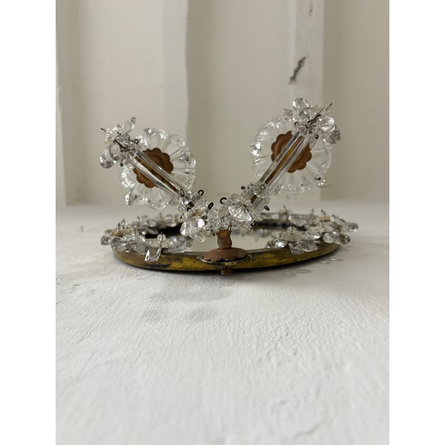 Housing 2 lights each, sitting in crystal bobeches dripping with crystals. These will be rewired with certified UL US...