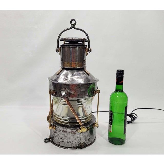 Anchor lantern from a boat of steel, copper and brass construction. Great piece of industrial lighting. Clear glass...