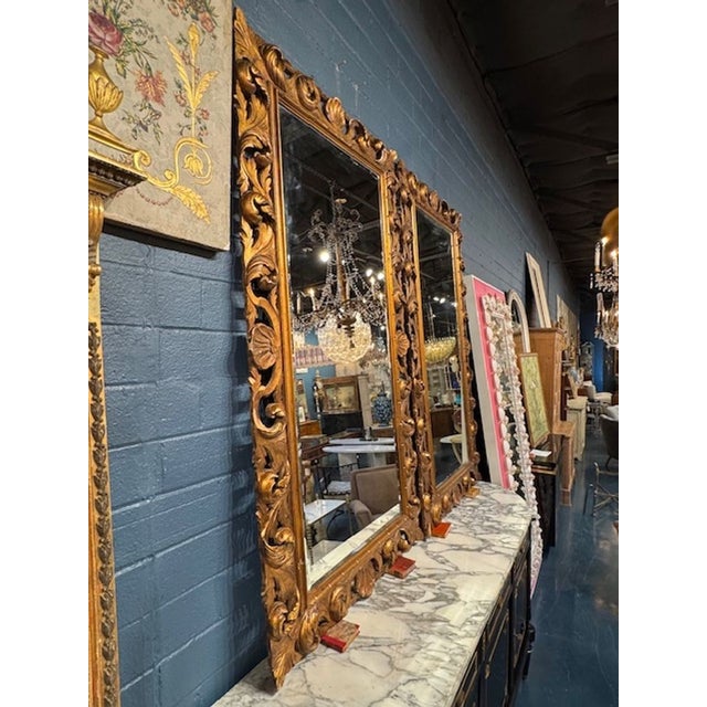 Pair of early 20th century Italian carved Florentine style giltwood mirrors. Very stunning in person! Circa 1920. 42w x 76h