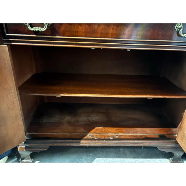 Offered is a vintage 1940’s display cabinet by Bernhardt Furniture. This piece features two removable wooden shelves in...