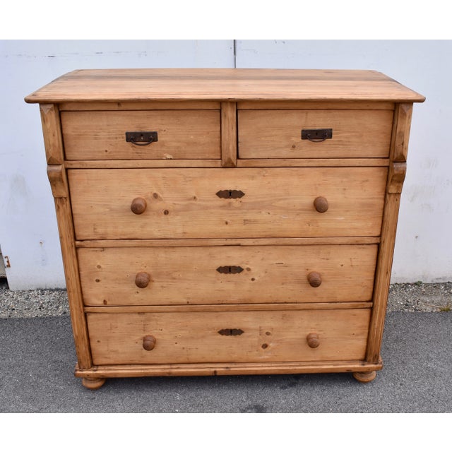 Five drawer chests from this source are often more decorative, especially around the top drawers. In this case the chest...
