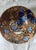 This vibrant earthenware bowl features the highly collectible "Amstel" pattern, meticulously conceived by the celebrated...