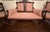 Offered by Mission Opaline, this exquisite 3-piece Antique American Victorian parlor suite is a stunning example of the...